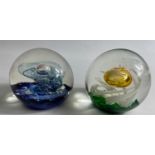 Two medium sized SELKIRK GLASS paperweights with original stickers still in situ on the base of