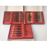 Three boxes of quality, possibly Thai, BRONZE AND ROSEWOOD cutlery - 6 each of dessert forks,