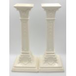 A pair of HANDSOME QUALITY VINTAGE CERAMIC candle sticks in neo-classical style and interestingly