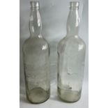 A pair of old GIANT WHISKY BOTTLES (HALF A METRE TALL )