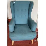 A modern (only a couple of years old!) easy lounge chair in blue fabric with nice light ash legs -