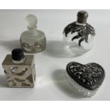 A small collection of three GLASS PERFUME BOTTLES with ornamental metal trim plus one tinket box