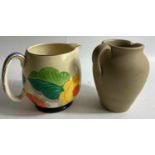 Two jugs- one cheerful with a design of yellow and blue flowers by GRAY'S POTTERY, HANLEY standing