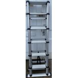 A set of TELESTEPS OF SWEDEN telescopic aluminium 6 step A frame ladders which extend 1.7m