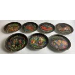 A set of 12 highly decorative GERMAN collector plates still in their collectors boxes