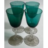 Four small WINE GLASSES in an unusual blue/green colour.