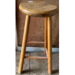 A pine bar stool