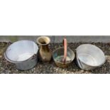 A collection of three VINTAGE jelly pans largest diameter 30cm one brass and two aluminium with a