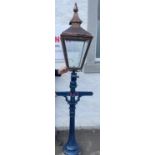 An 1869 half lamp standard in cast metal (must be around 100lbs in weight) with large copperhead