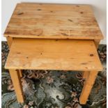 A rickety nest of two pine low side nest of two tables just ready for UPCYCLING!