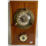 A nice brass clock and barometer 55cm x 33cm