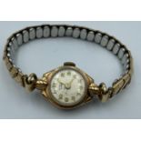 A 375 yellow gold cased VINTAGE ladies watch 15.4g gross