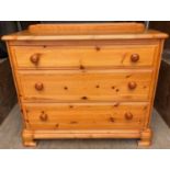 A STURDY low ANTIQUE PINE chest of drawers with 3 drawers and pine knobs