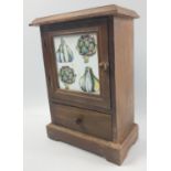 A small RETRO GARLIC CABINET standing just 24cm high with one drawer to base, cupboard door has a