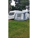 Caravan awning in two bags to fit an ELDDIS 'Hurricane' caravan, with poles and awning dimensions