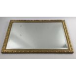 A BEVEL-edged gilt framed wall mirror in a battered and bruised gilt stucco frame! - Looks Great!