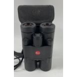 A pair of LEICA Ultravid 10x25 Compact BINOCULARS in their case