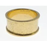 750 stamped yellow gold hammered effect plain WEDDING BAND, ring size P, weight 10.50g