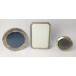 Three small silver hallmarked PHOTO FRAMES, 2 (13.5 x 9.5cm and 7.5cm dia) with Birmingham