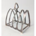 A Sheffield silver hallmarked 1932 TOASTRACK by silversmith JAMES DEAKIN & SONS height 9cm, gross