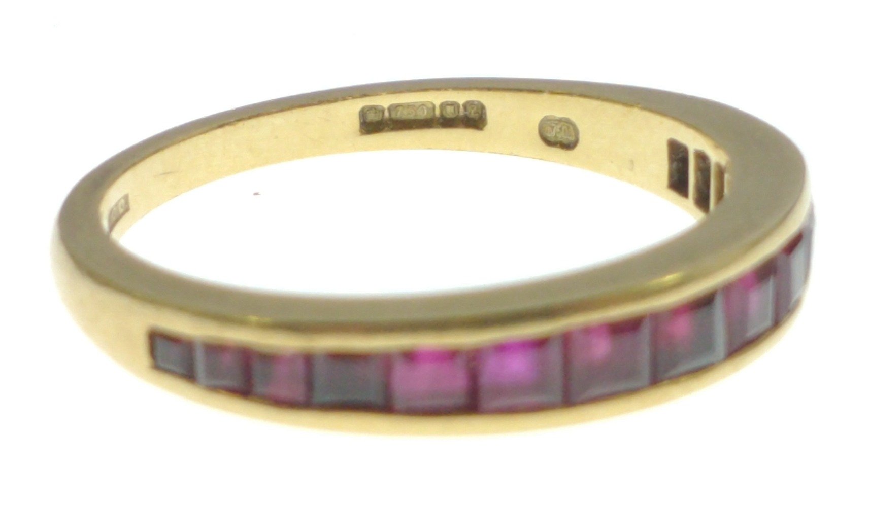 A 750 stamped yellow gold half eternity style 16 graduating ruby set RING size O, gross weight - Image 4 of 4