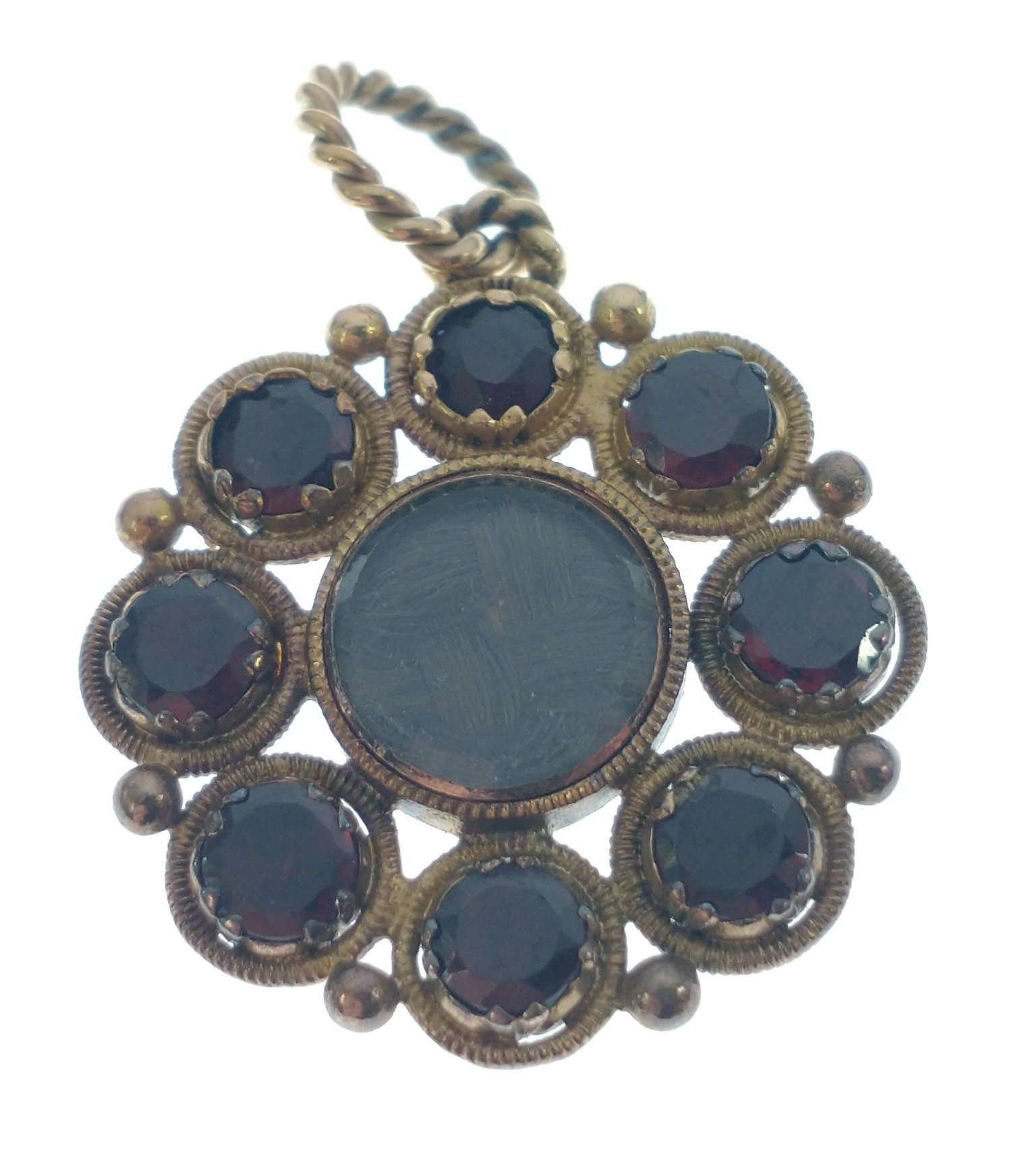 NICE QUALITY! VINTAGE 'yellow metal' mourning PENDANT set with 8 garnets surrounding woven hair,