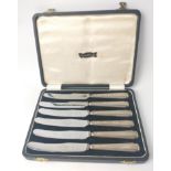 A boxed set of six Sheffield silver hallmarked 1954 handled FRUIT KNIVES in original presentation