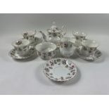 A part ROYAL ALBERT WINSOME tea service to include 4 cups, 5 saucers, 3 side plates, small teapot,