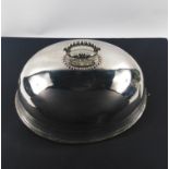 A medium sized vintage white metal domed meat cover 37cm long and approx 25cm high, surface has a