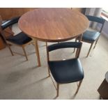 A McIntosh (Kirkcaldy) extending teak dining table and four chairs (122cm diameter) The four