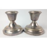 A pair of Dublin hallmarked 1975 small CANDLESTICKS by silversmith JEWELLERY & METAL MANUFACTURING