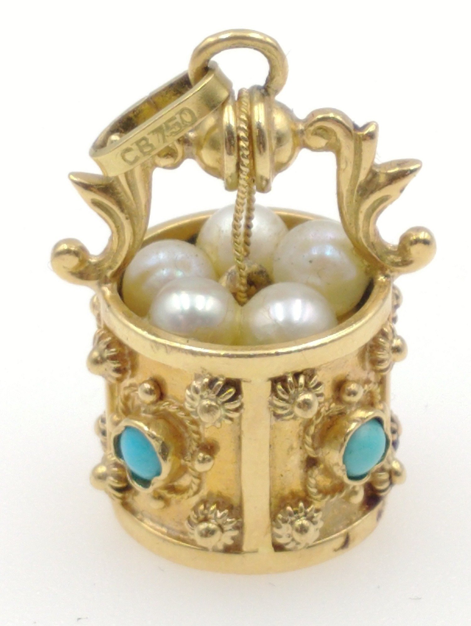 A FANTASTIC & SUBSTANTIAL 750 stamped PENDANT in wishing well form set with 4 turquoise and 5