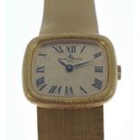 A BAUME & MERCIER 750 stamped yellow gold ladies WRIST WATCH and bracelet clasp stamped 750, with