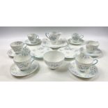 A vintage SHELLEY 'Blue Rock' tea set to include 6 each of cups, saucers, side plates, plus milk