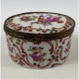 A nice circa late 19th century decorative porcelain with brass trim oval lidded TRINKET DISH with