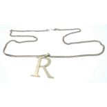 SUBSTANTIAL 750 hallmarked letter R on a 750 hallmarked curb CHAIN (fastener requires light