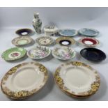 A mixed china lot including cabinet saucers from Royal Crown Derby, Aynsley, Wedgwood, Royal