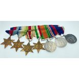 A MEDAL GROUPING belonging to Signaller Smith, to include The ROYAL NAVAL RESERVE LONG SERVICE