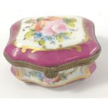 A pretty porcelain lidded hand painted trinket box possibly French 7x6x4cm