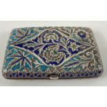 A VINTAGE Russian blue and turquoise enamelled silver coloured card case with gilt interior