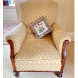 FABULOUS VICTORIAN armchair with claw and ball feet and re-covered in deep yellow pattern fabric