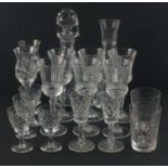 A mixed crystal glassware lot of a decanter standing 28m tall, 2 wine glasses to match the