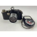 A vintage 1932 LEICA ll RANGEFINDER CAMERA (no 86484), black in original case, with also a SUPER