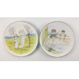 Two charming vintage hand-painted plates with gilt rim (28cm dia), the first of 2 small children