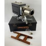 A VINTAGE OPTISCOPE No8 part 'Magic Lantern circa 1930's/40's, with spare bulb, all within its