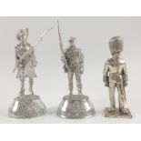 Three unpainted pewter soldier figurines, a GORDON HIGHLANDER (12cm tall), a SCOTS GUARDSMAN (11cm