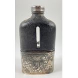 A quality quarter bottle size hip flask in leather and EPNS, heavily decorated and inscribed 1911