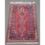 A BEAUTIFUL SHIRAZ carpet, this Shiraz carpet is a type of Persian rug made in the villages around