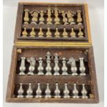 UNUSUAL! A VINTAGE wooden cased brass and white metal CHESS SET, within two layers of the box
