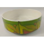 A vintage abstract POOLE POTTERY bowl predominantly in shades of green with some red, 20cm dia,
